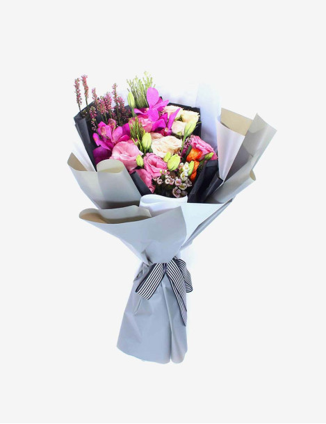 A Mix Roses Bouquet In Pink Packing
