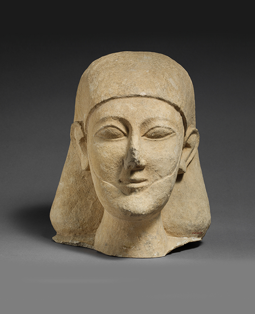 stone sculpture of a male head